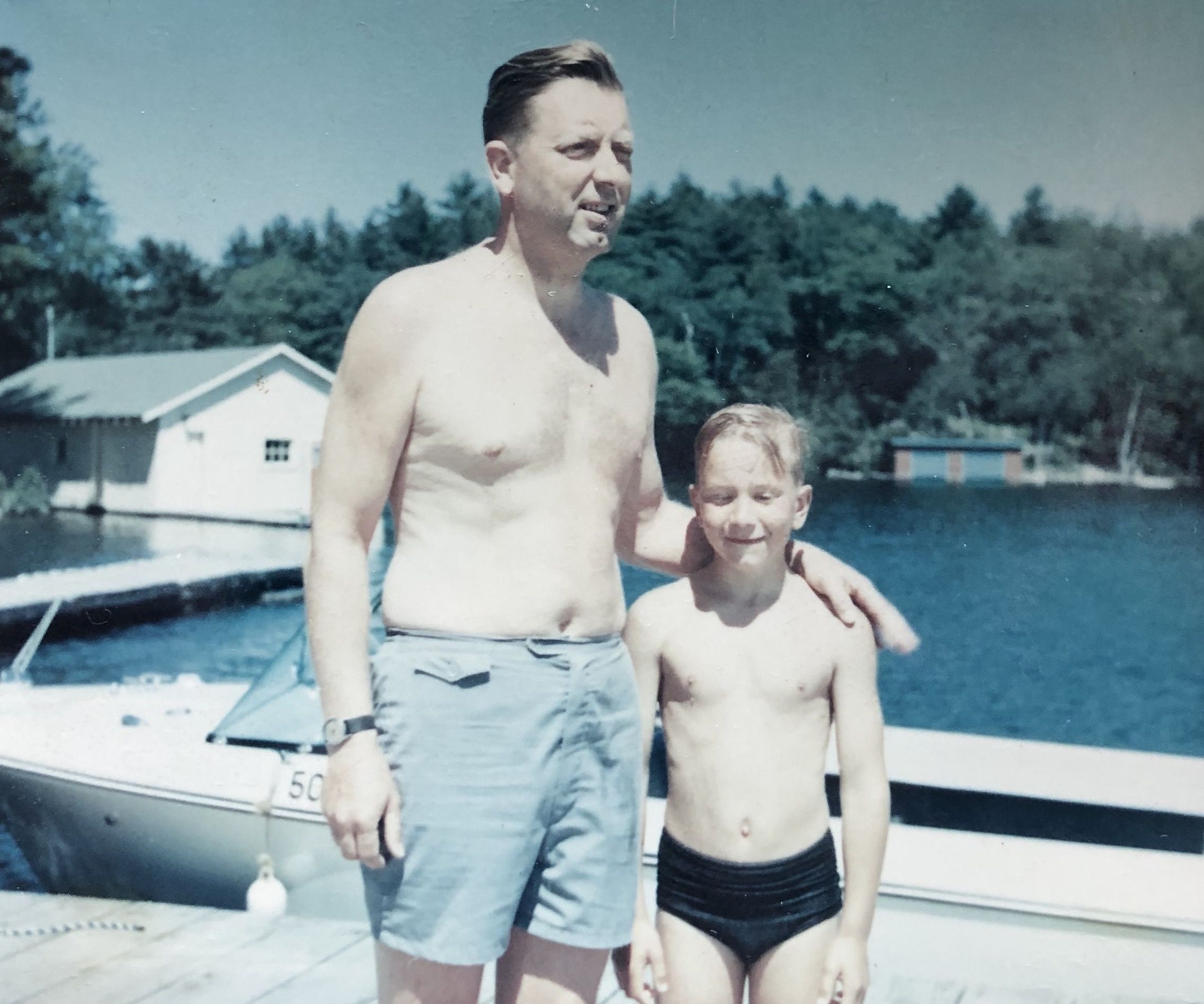 Me, 8, with dad. "Be a good lad and piss off so mum and I can day-drink with our friends."